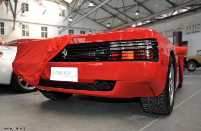 young boy sitting in barbers chair